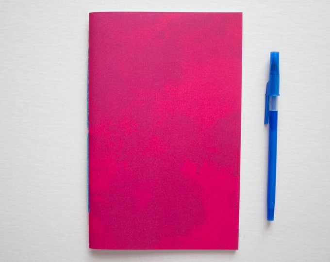 Pink Watercolor Notebook with Blue Pages