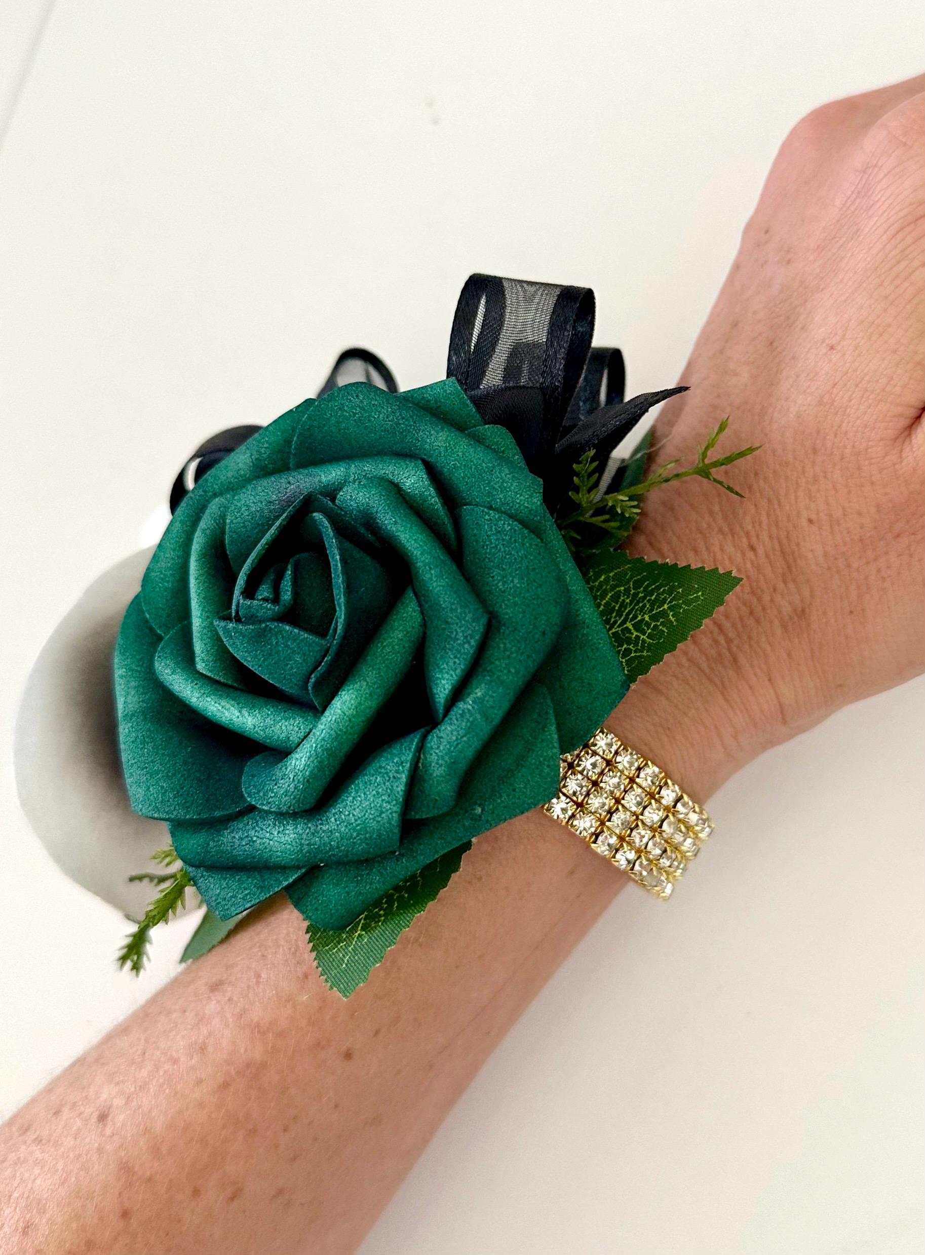 green emerald velvet dress Emerald Rose Boutonniere – flower arrangement | Las Vegas, NV main image 0