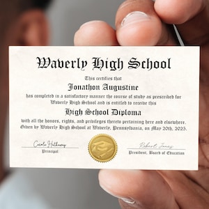 May include: A high school diploma certificate with a gold seal and the text "Waverly High School" at the top. The certificate is held in a hand and the text "This certifies that Jonathon Augustine has completed in a satisfactory manner the course of study as prescribed for Waverly High School and is entitled to receive this High School Diploma with all the honors, rights, and privileges thereto pertaining here and elsewhere. Given by Waverly High School at Waverly, Pennsylvania, on May 20th, 2025." is visible.