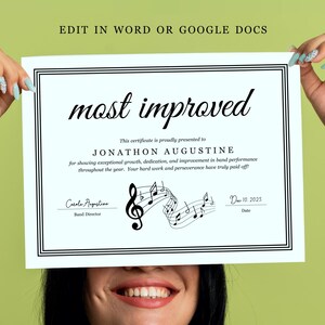 May include: A white certificate with black text and a double black border is held up. The certificate reads "most improved" and includes the name "Jonathon Augustine" and a musical note graphic. The text "Edit in Word or Google Docs" is at the top.