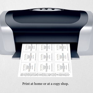 May include: A black and silver printer with a sheet of paper emerging from the paper tray. The paper has a grid of small squares on it. The text "Print at home or at a copy shop." is below the printer.