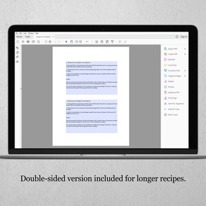 May include: A laptop displays a PDF document with text, likely a recipe or instructions. The screen shows a white document with black text. The laptop is on a light gray surface. The text at the bottom of the screen reads: "Double-sided version included for longer recipes."