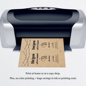 May include: A printer printing out a brown paper sign with the text "free tacos (and we're engaged)" and a drawing of two tacos. The sign is for a wedding or engagement party.