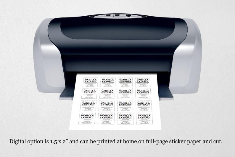 May include: A black and silver desktop printer outputting a sheet of white paper with sixteen rectangular labels printed in black ink. Each label features the text Vanilla Extract in a bold serif font with smaller decorative script text below.
