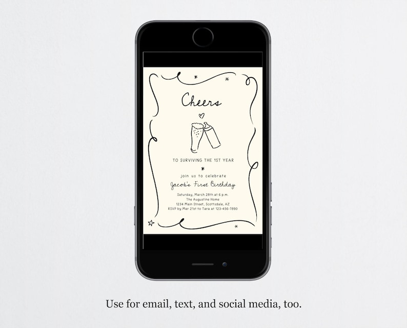 May include: A smartphone screen shows a cream-coloured invitation with black text and illustrations. The invitation says "Cheers" above two toasting glasses, with details for a first birthday celebration. The phone is black, and the background is white.