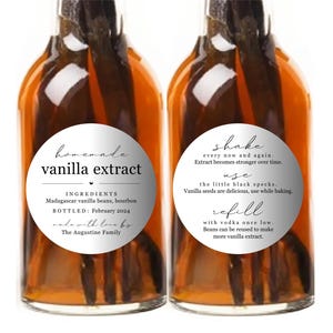 May include: Two glass bottles filled with amber liquid and dark vanilla beans. The front label reads: homemade vanilla extract, INGREDIENTS Madagascar vanilla beans, bourbon, BOTTLED: February 2024, made with love by The Augustine Family. The back label reads: shake every now and again, use the little black specks, refill with vodka once low.