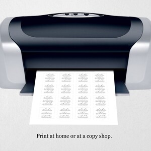 May include: A black and silver desktop printer feeding a white sheet of paper with a grid of twenty small rectangular labels featuring black text. Below the printer, the text reads: Print at home or at a copy shop.