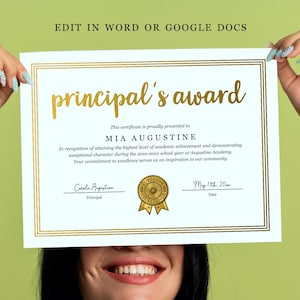 May include: A certificate with gold foil lettering that reads "principal's award". The certificate is presented to Mia Augustine and includes text about academic achievement. The certificate has a gold border and a gold seal.