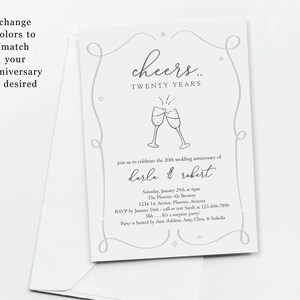 May include: A white wedding invitation with a gray border and a gray illustration of two champagne glasses. The text reads "Cheers to Twenty Years" and "Join us to celebrate the 20th wedding anniversary of Darla & Robert".