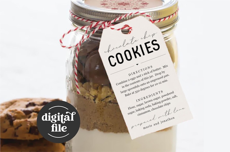 May include: A glass jar filled with cookie dough ingredients, with a white tag attached that reads "chocolate chip cookies" and includes instructions and ingredients. The tag also says "prepared with love, marie and jonathon".