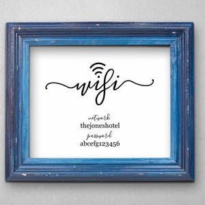 May include: A framed print with the word "wifi" in a cursive font. The network name is "thejoneshotel" and the password is "abcefg123456".