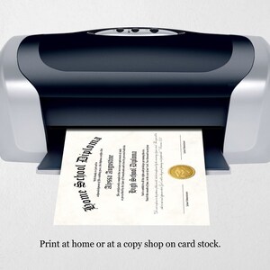 May include: A black and silver printer with a white sheet of paper coming out of the paper tray. The paper has a black and white text that reads "Home School Diploma" and "Alyssa Augustine" and "High School Diploma". The text "Print at home or at a copy shop on card stock." is below the printer.