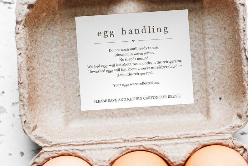 May include: A white card with the text "egg handling" in a brown cardboard egg carton. The card provides instructions on how to handle eggs, including washing, storage, and shelf life. It also states that the eggs were collected on a specific date. The card ends with the message "PLEASE SAVE AND RETURN CARTON FOR REUSE."