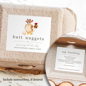 May include: A cardboard egg carton with a label that reads "butt nuggets" and features a cartoon chicken illustration. The open carton reveals eggs and a smaller label with egg handling instructions.