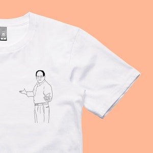 T-shirt George Costanza avec haussement d'épaules