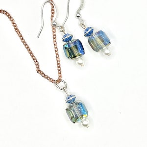 Winter skies. Beautiful shiny, iridescent dangle earrings & necklace set. Square cube faceted blue glass w/hypoallergenic silver and Copper