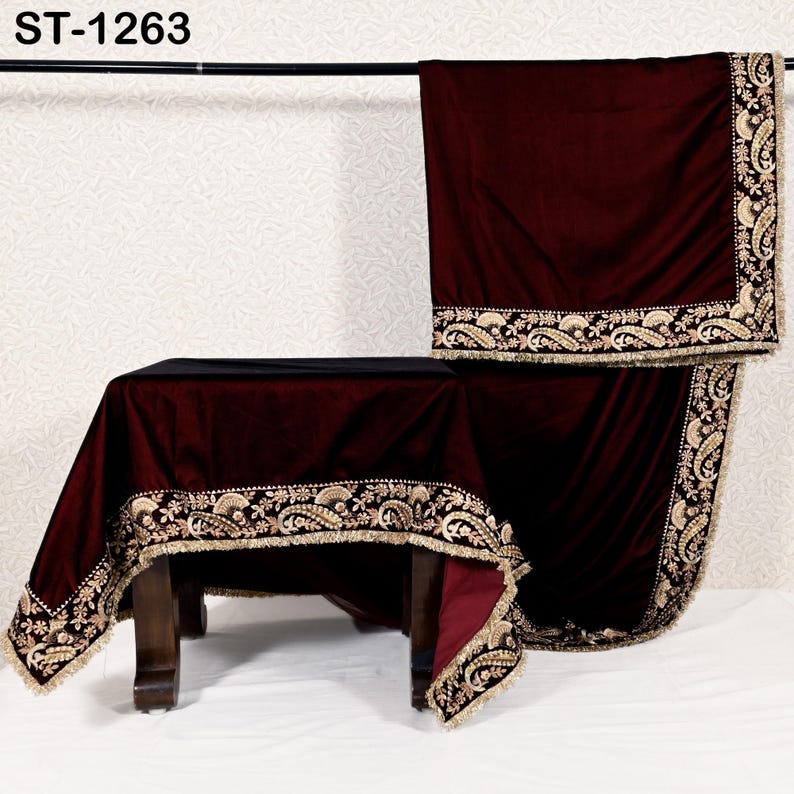 May include: A burgundy velvet table cover and matching draped fabric with ornate gold embroidery and fringe trim. The table cover is draped over a dark wooden table. The text "ST-1263" is in the top left corner.