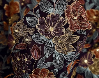 May include: Black chiffon fabric with embroidered floral design in shades of burgundy, gold, and teal. The fabric features a repeating pattern of flowers and leaves.