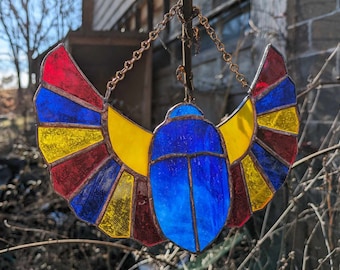 PATRÓN DE ESCARABATO DE VITRINA