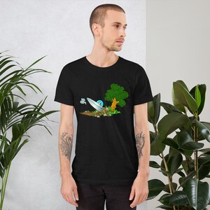 Space Unicorn Short-Sleeve Unisex T-Shirt, hilarious fantasy Unicorn crashes a UFO sci-fi spaceship into tree. Humor doodle confusion