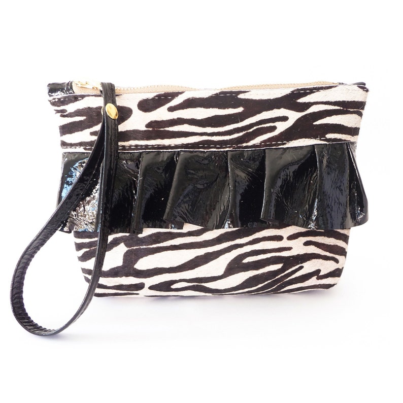 black patent leather clutch bag