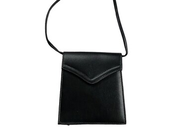 Monedero minimalista de cuero negro de los años 80
