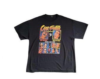 Camiseta negra vintage con estampado de cómic