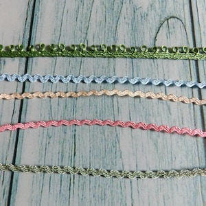 5 Yards Total  4 cuts 1/8 Inch assorted Rick Rack and 1 yard 1/4 &quot;loop trim in green