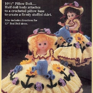 May include: Two crocheted dolls dressed in yellow and white dresses with floral accents. The dolls are holding blue watering cans. The dolls are 10 1/2 inches tall and 13 inches tall. The pattern is called "Mary Quite Contrary".