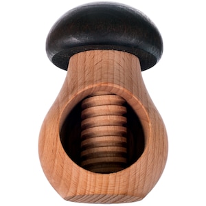 May include: A wooden nutcracker shaped like a mushroom with a dark brown top and a light brown body. The nutcracker has a threaded screw in the center.