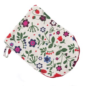 May include: A white oven mitt with a red trim and a floral pattern featuring red, pink, blue, and green flowers.