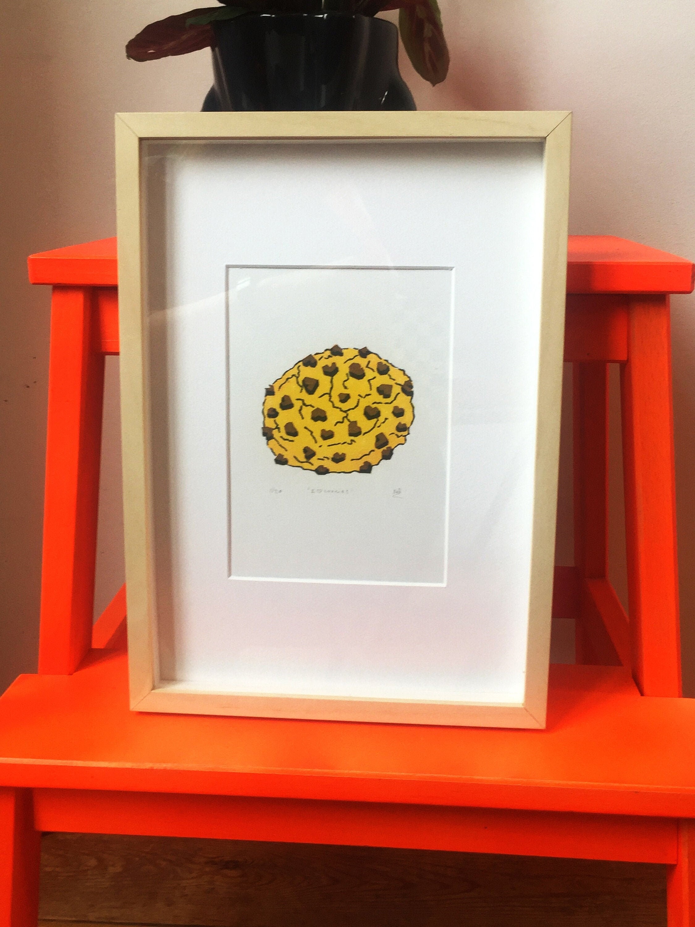 Lino print of cookie with heart shaped chocolate chips | limited hand printed 4 colour linocut | Studio Nulzet