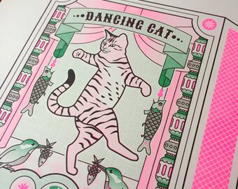 Risograph print of dancing cat on a theatre stage | riso print in fluorescent pink and green | Studio Nulzet
