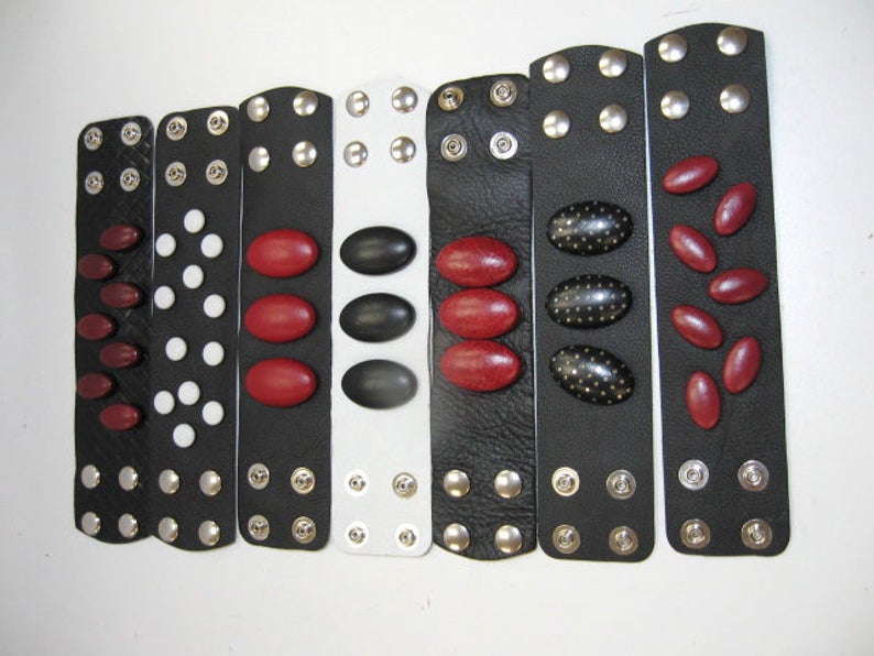 Genuine Leather Wristband with Snap Closure in Black with Red Leather Covered Buttons