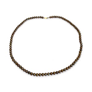 May include: A dark brown beaded necklace with a gold clasp. The necklace is composed of small, round beads, evenly spaced along the strand. The beads have a subtle sheen, reflecting light. The necklace is displayed against a white background.