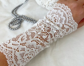 Guantes blancos de encaje sin dedos: Puños elásticos para bodas
