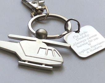 May include: Silver helicopter keychain with a square tag that reads "Fly Safe Daddy. Always come home to us. Sophia, Harrison & Hudson".