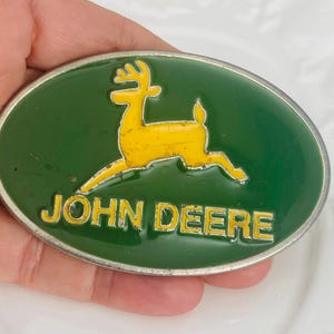 Vintage John Deere Tractors 1968 Deer Emblem belt buckle-green John Deere buckle-measures 3” x 2”