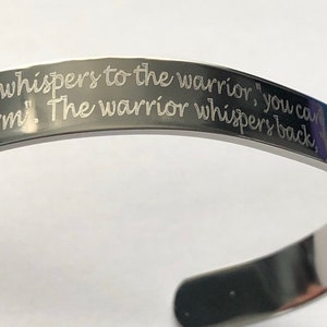 Fate whispers to the warrior, you can not withstand the storm, the warrior whispers back, I am the Storm-engraved cuff-