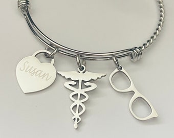 Optometrist bracelet/Eye Doctor bracelet with name charm, medical symbol Caduceus, eye glasses charm. All stainless steel charms