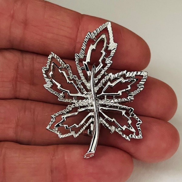 Vintage leaf brooch Signed Gerry’s-silver color metal-measures 1 1/4” x 1 3/4”