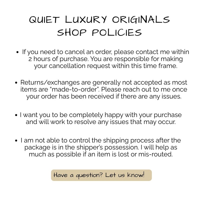 May include: A white ceramic mug with a black handle and the text "But First, Coffee" in a bold, black font. The mug is set against a blurred background, suggesting a cozy setting.
