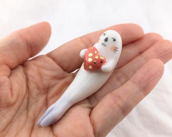 Porcelain Otter Firugrine with Heart, Miniature Ceramic Animal (US Tariff Free)