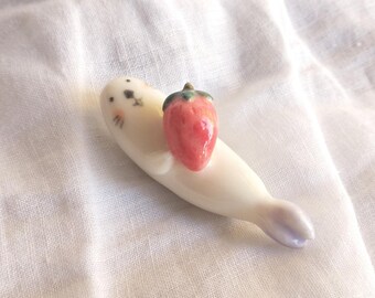 Porcelain Otter Firugrine with Strawberry, Miniature Ceramic Animal (US Tariff Free)