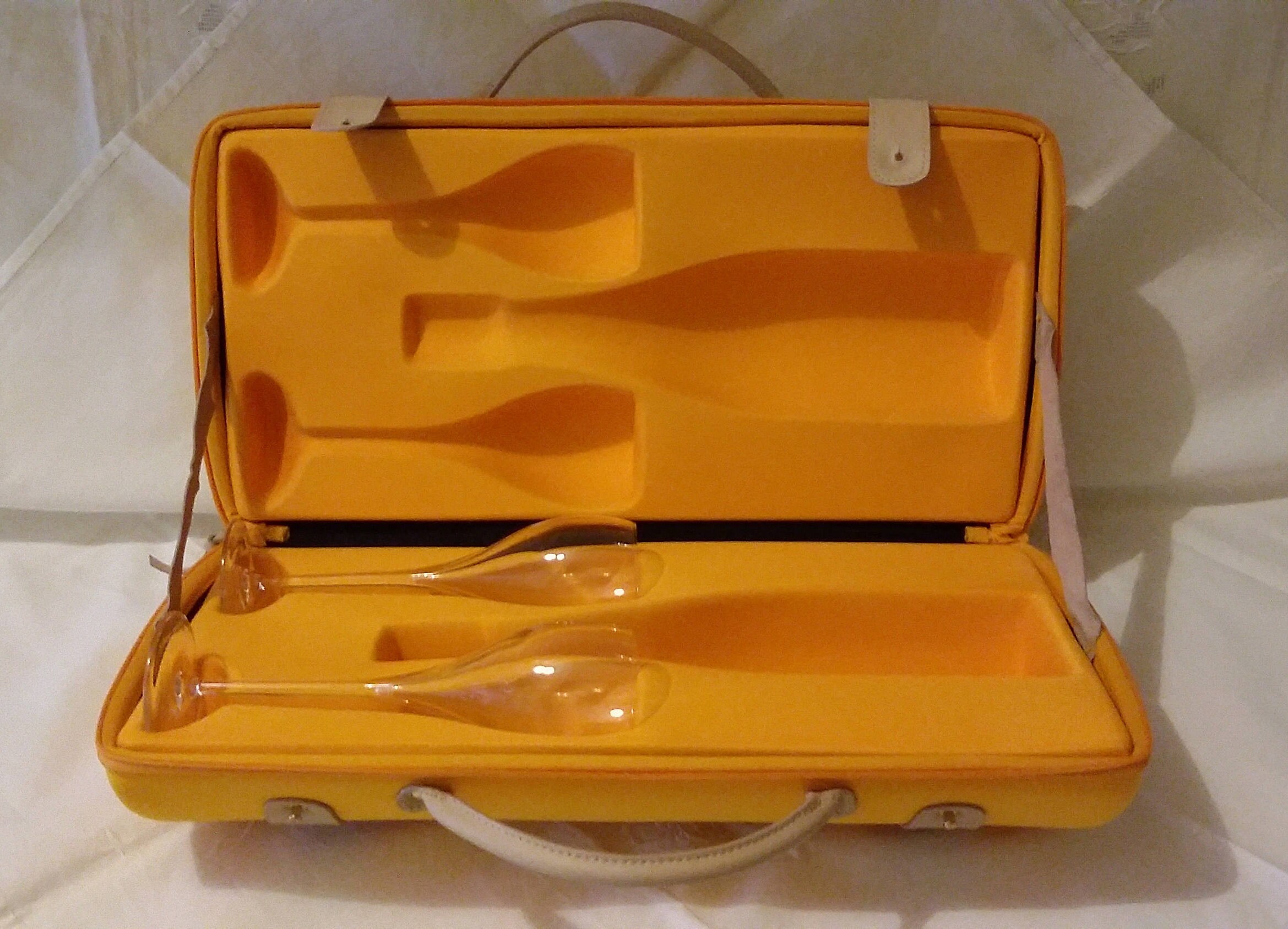 Bag bag produced by Louis Vuitton for champagne Veuve Clicquot Ponsardin  Reims France complete with glass goblets.