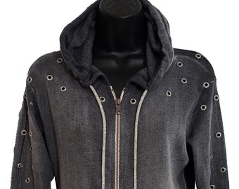 May include: A dark gray hooded sweatshirt with a zipper closure and silver grommets on the sleeves. The sweatshirt has a drawstring hood and two pockets.