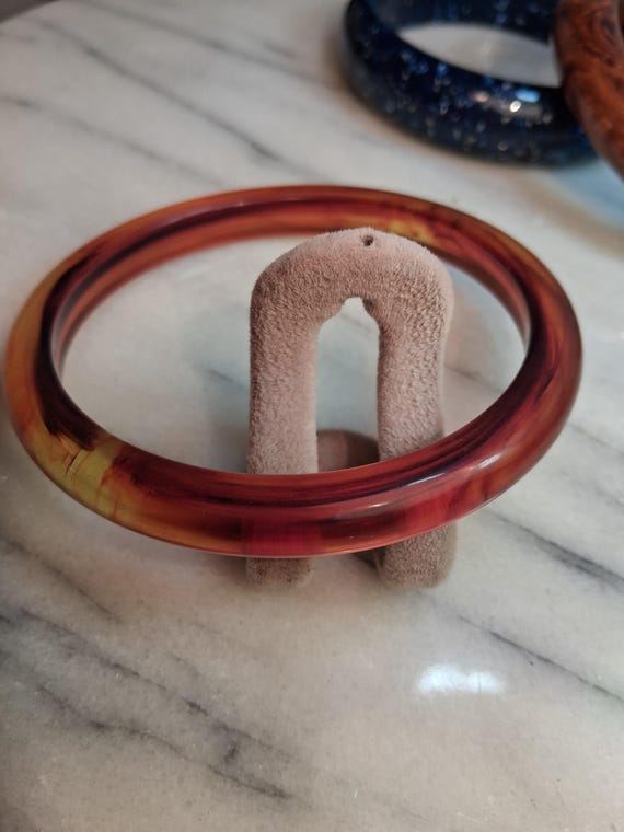 Apple Juice With Brown Swirl Lucite Bangle Bracelet