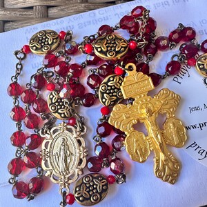 Vintage red Fire Polished Glass Beads Rosary, ornate gold tone our father Beads, Miraculous medalCenter with special Pardon Crucifix nice