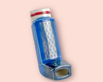 Gold Swoop Doodles on Realistic Blue Inhaler