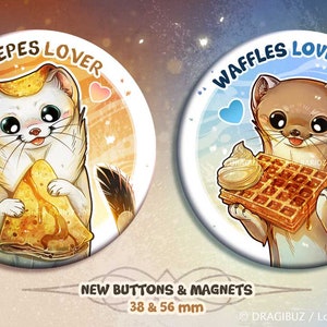 Peut inclure: Deux boutons ronds représentant une belette de dessin animé tenant une crêpe et une gaufre. Les boutons mesurent 38 et 56 mm de diamètre. Le texte sur les boutons indique "Crepes Lover" et "Waffles Lover".